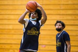Jailin Johnson makes a three-point shot during practice at Mariner High School on Thursday, Feb. 10, 2022 in Everett, Wa. (Olivia Vanni / The Herald)