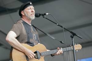 FILE - Richard Thompson performs during the 2008 New Orleans Jazz & Heritage Festival at the New Orleans Fairgrounds Racetrack in New Orleans, on May 2, 2008. Thompson's book "Beeswing: Losing My Way and Finding My Voice 1967–1975" released on April 6. (AP Photo/Dave Martin, File)