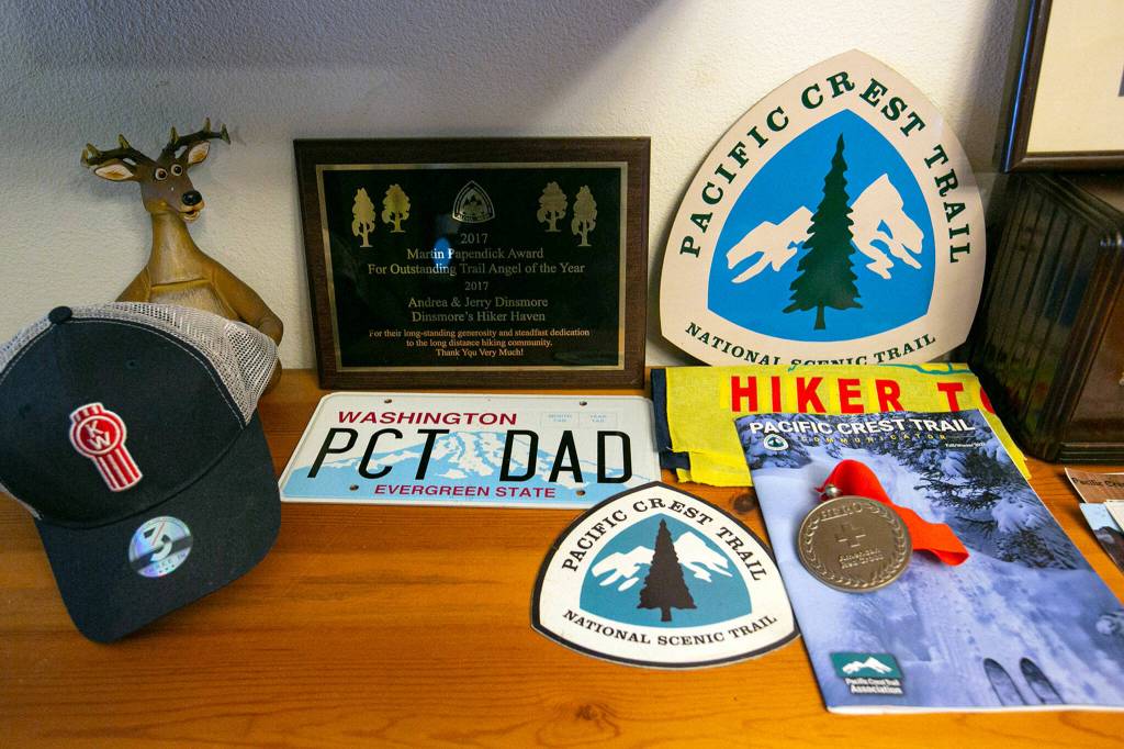 An award  a personalized license plate  and other memorabilia inside Jerry Dinsmores home in Baring. (Ryan Berry / The Herald)