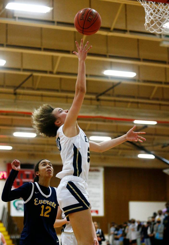 Arlingtons Samara Morrow goes for a layup against Everett Tuesday, Feb. 15, 2022, at Marysville Pilchuck High School in Marysville, Washington. (Ryan Berry / The Herald)