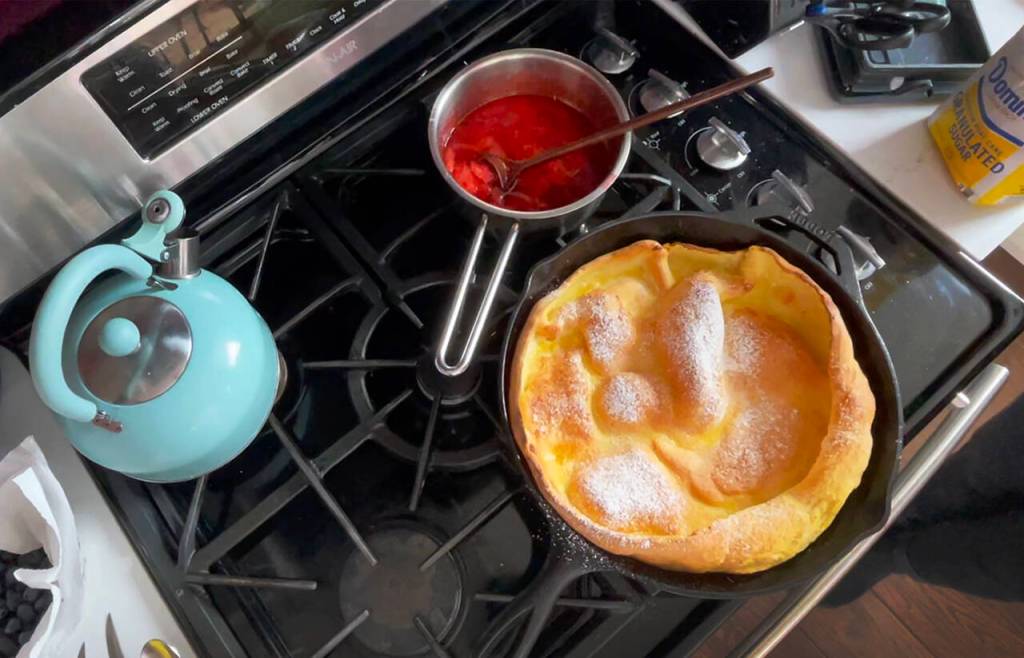 Herald food reporter Taylor Goebel made this Dutch baby in her home kitchen Feb. 21. She sprinkled it with powdered sugar and topped it with strawberry compote. (Video screenshot / The Herald)