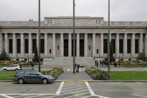 The Temple of Justice is shown Thursday, April 23, 2020, at the Capitol in Olympia, Wash., as Washington state Supreme Court justices hear oral arguments inside — but using remote video technology — in a case that addresses the safety of prison inmates during the coronavirus outbreak. Justices used remote video technology to conduct the court business and distance themselves from each other while broadcasting the arguments to viewers. During the hearing, lawmakers, law enforcement officials, and crime victims held a news conference to protest the release of some offenders. (AP Photo/Ted S. Warren)