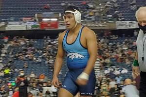 Meadowdale's Saul Hernandez walks off the mat after beating Stanwood's Mason Ferguson by decision in a 3A 182-pound quarterfinal match at Mat Classic XXXIII on Feb. 18, 2022, at the Tacoma Dome. (Zac Hereth / The Herald)