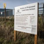 A sign of proposed land use at the Cedar Valley Ballfield in Lynnwood. (Olivia Vanni / The Herald)