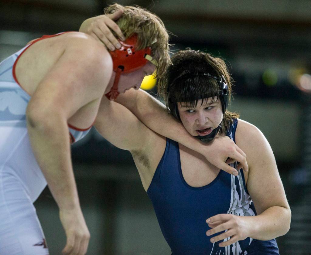 Glacier Peaks Connor Aney wrestles with Kamiakins Jaxin McCallum during the 4A 285-pound championship match at the Mat Classic XXXIII on Saturday in Tacoma. (Olivia Vanni / The Herald)