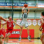 Shorecrests Parker Baumann pulls up for a jumper Saturday afternoon at during the 3A District Tournament at Everett Community College in Everett, Washington on February 19, 2022. (Kevin Clark / The Herald )