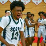 Shorecrest’s Newton Pepple celebrates their win over Stanwood Saturday afternoon at during the 3A District Tournament at Everett Community College in Everett, Washington on February 19, 2022. (Kevin Clark / The Herald )