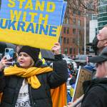 Hundreds of people gathered Saturday at the Seattle Center to protest Russias invasion of Ukraine. (Taylor Goebel / The Herald)