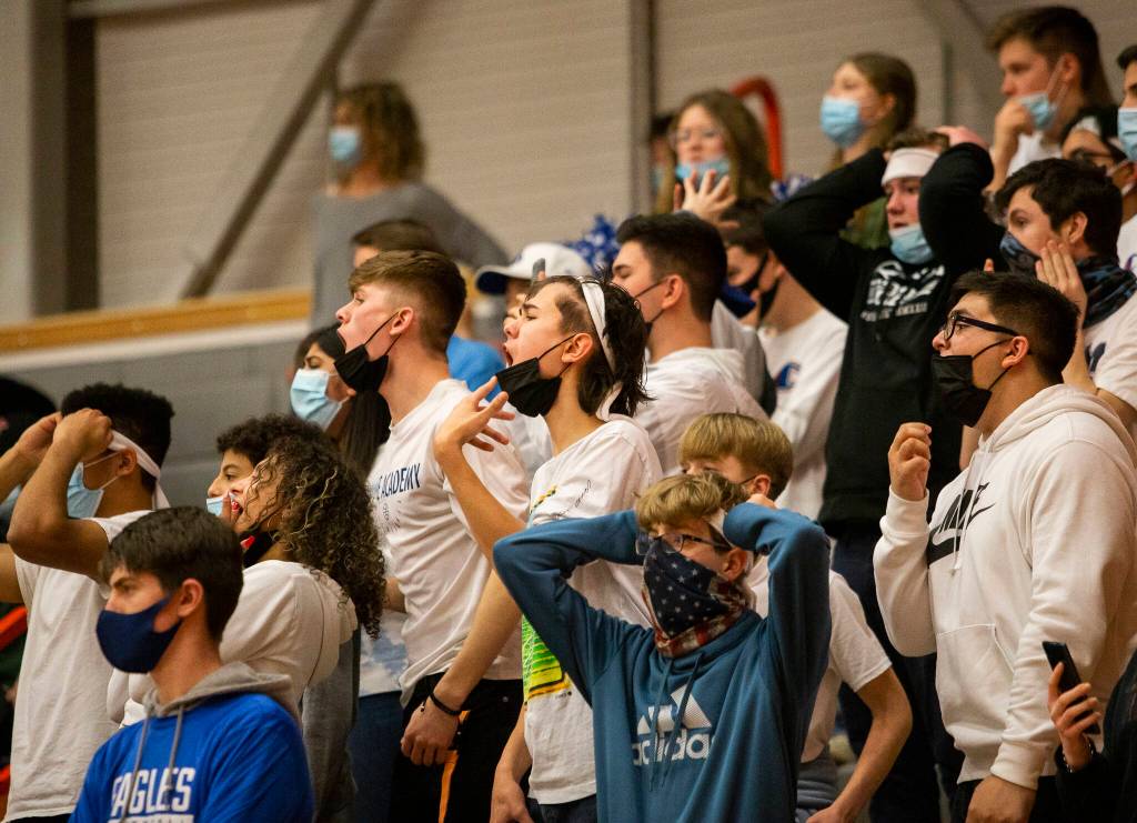 Grace Academy fans react to a stolen ball during the game against Cusick on Friday, Feb. 25, 2022 in Everett, Washington. (Olivia Vanni / The Herald)