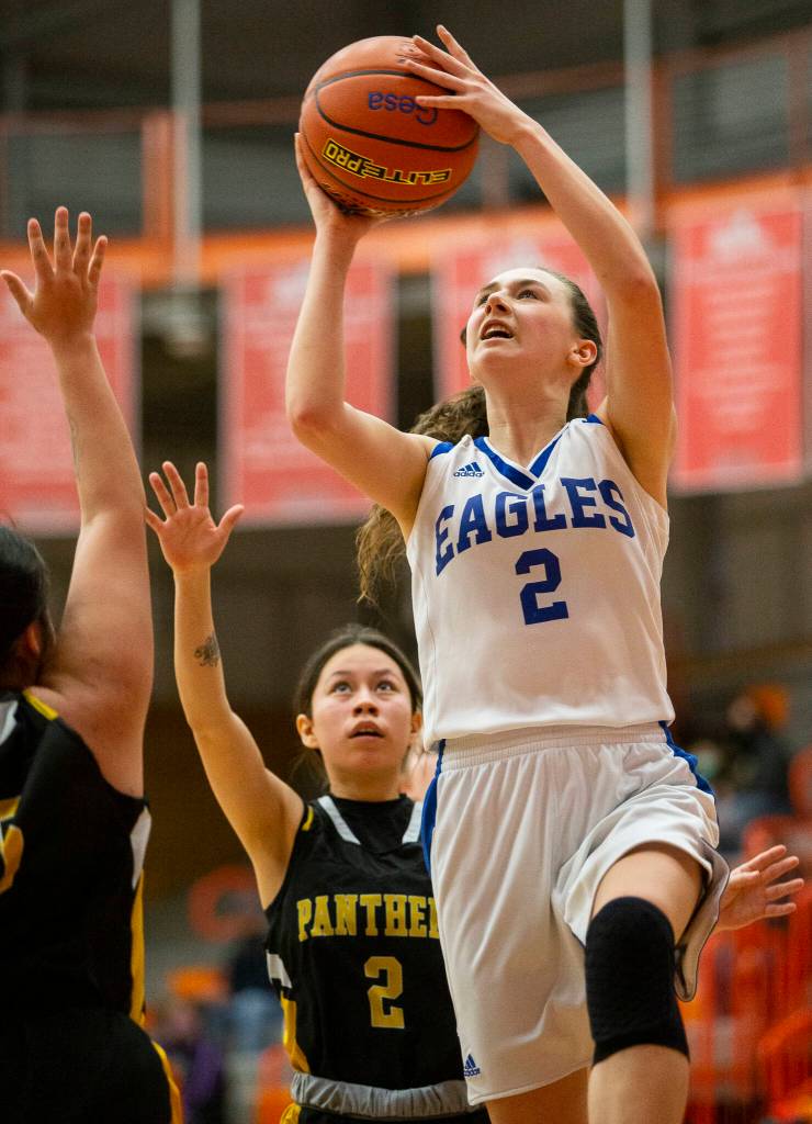 Grace Academys Zia Fackenthal attempts a layup during the game against Cusick on Friday, Feb. 25, 2022 in Everett, Washington. (Olivia Vanni / The Herald)