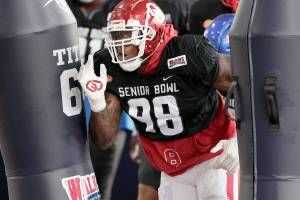 National Team defensive lineman Perrion Winfrey of Oklahoma (98) runs through drills during practice for the Senior Bowl NCAA college football game Thursday, Feb. 3, 2022, in Mobile, Ala. (AP Photo/Butch Dill)