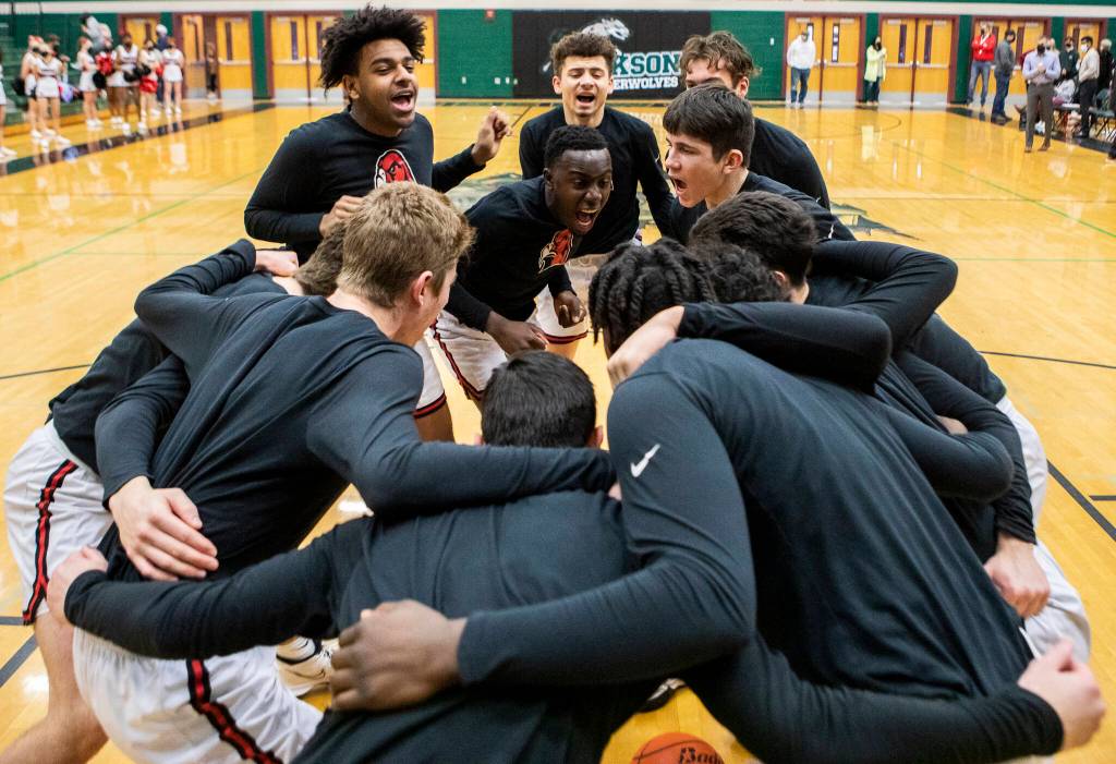 Mountlake Terrace players get pumped up before the start of the game against Kelso on Saturday, Feb. 26, 2022 in Mill Creek, Washington. (Olivia Vanni / The Herald)