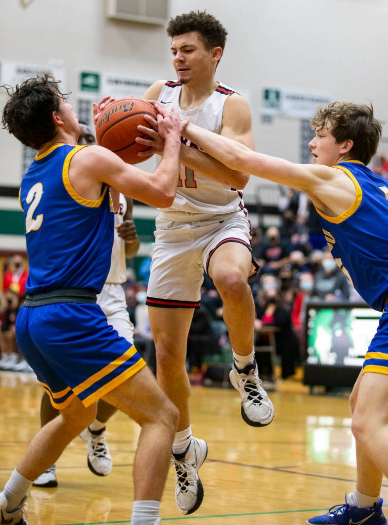 Mountlake Terraces Chris Meegan is fouled during the game against Kelso on Saturday, Feb. 26, 2022 in Mill Creek, Washington. (Olivia Vanni / The Herald)