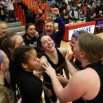 Hermiston celebrates a last-second victory over Everett Saturday, Feb. 26, 2022, during a Class 3A regional matchup at Everett Community College in Everett, Washington. (Ryan Berry / The Herald)