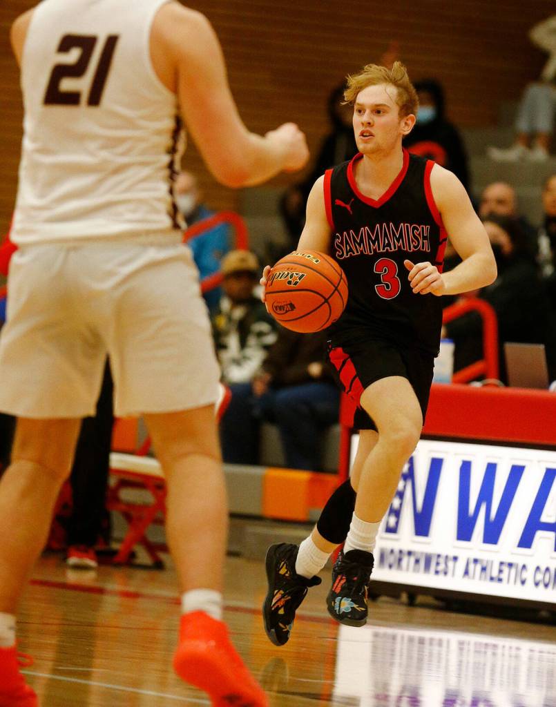 Sammamishs Nate Alessi looks to set up a play against Lakewood Saturday, Feb. 26, 2022, during a Class 2A regional matchup at Everett Community College in Everett, Washington. (Ryan Berry / The Herald)