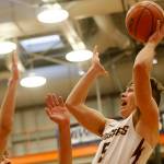 Lakewood’s Justice Taylor goes for an acrobatic layup against Sammamish Saturday, Feb. 26, 2022, during a Class 2A regional matchup at Everett Community College in Everett, Washington. (Ryan Berry / The Herald)