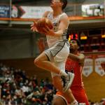 Glacier Peaks Bobby Siebers takes to the air against Graham-Kapowsin Saturday, Feb. 26, 2022, during a Class 4A regional matchup at Everett Community College in Everett, Washington. (Ryan Berry / The Herald)