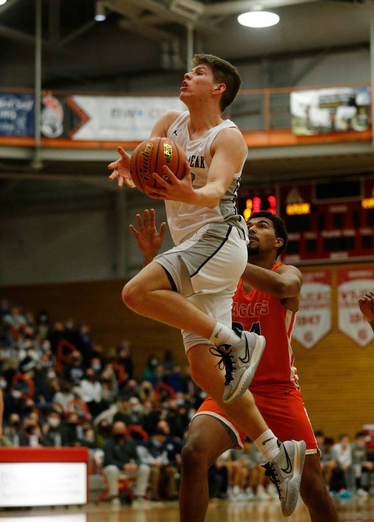 Glacier Peaks Bobby Siebers takes to the air against Graham-Kapowsin Saturday, Feb. 26, 2022, during a Class 4A regional matchup at Everett Community College in Everett, Washington. (Ryan Berry / The Herald)