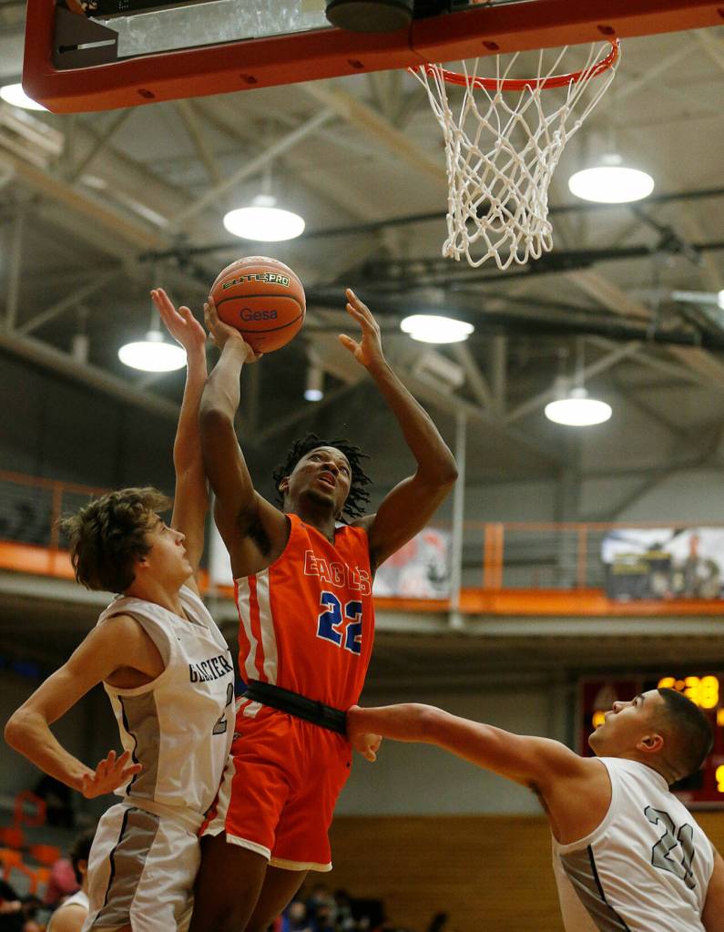 Graham-Kapowsins Christian Ballah takes a shot against Glacier Peak Saturday, Feb. 26, 2022, during a Class 4A regional matchup at Everett Community College in Everett, Washington. (Ryan Berry / The Herald)