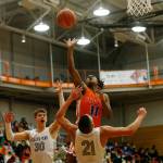 Graham-Kapowsins Nicholas Hunter takes a close range shot against Glacier Peak Saturday, Feb. 26, 2022, during a Class 4A regional matchup at Everett Community College in Everett, Washington. (Ryan Berry / The Herald)