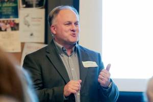 Steve Schuller, Interim City Administrator, addresses a meeting of the Bridge Builders Thursday night at Looking Glass Coffee in Snohomish on February 1, 2018. (Kevin Clark / The Daily Herald)