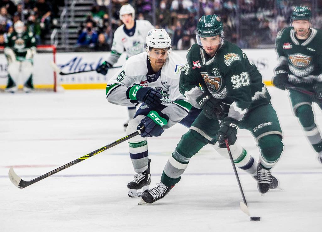 Everett Silvertips Alex Swetlikoff breaks away with the puck during the game against the Seattle Thunderbirds at Climate Pledge Arena on Saturday, Feb. 26, 2022 in Seattle, Washington. (Olivia Vanni / The Herald)