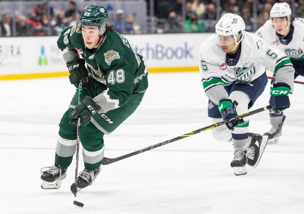 Everett Silvertips Olen Zellweger breaks away with the puck during the game against the Seattle Thunderbirds at Climate Pledge Arena on Saturday, Feb. 26, 2022 in Seattle, Washington. (Olivia Vanni / The Herald)