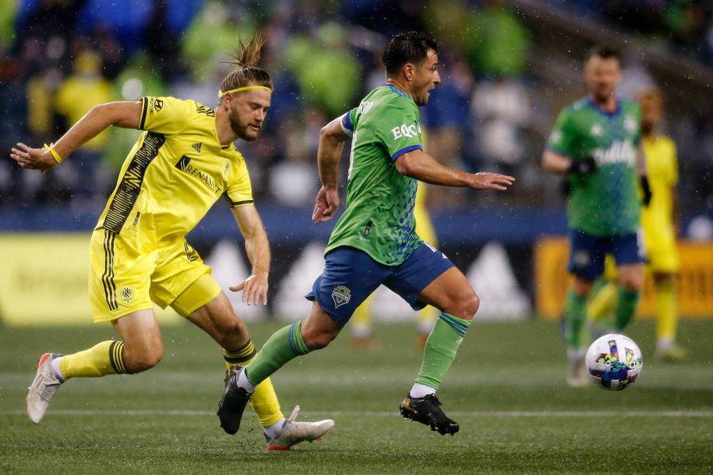 The Seattle Sounders’ Nicolas Lodeiro takes possession of the ball during the opening game of the 2022 season against Nashville SC on Sunday, Feb. 27, 2022, at Lumen Field in Seattle, Washington. (Ryan Berry / The Herald)
