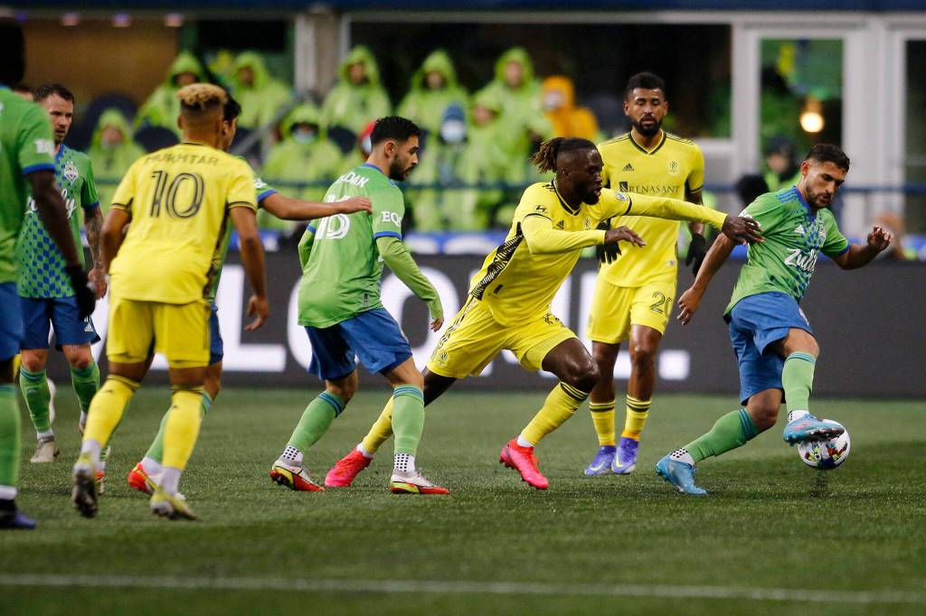 The Seattle Sounders Cristian Roldan takes possession of the ball during the Sounders opening game of the 2022 season against Nashville SC on Sunday, Feb. 27, 2022, at Lumen Field in Seattle, Washington. (Ryan Berry / The Herald)