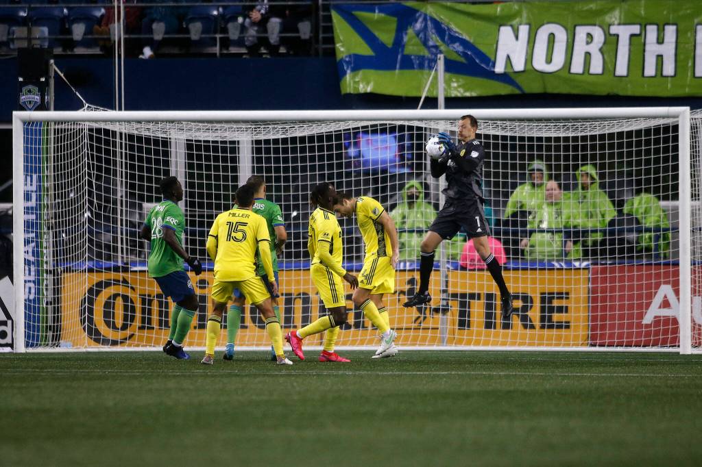 Nashville goaltender Joe Willis makes a save during the opening game of the 2022 season against Seattle on Sunday, Feb. 27, 2022, at Lumen Field in Seattle, Washington. (Ryan Berry / The Herald)