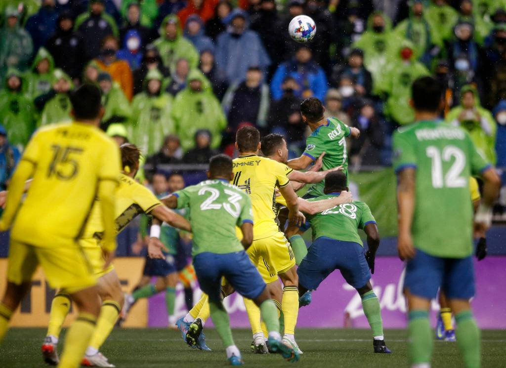 The Seattle Sounders try to score off a corner kick in the waning minutes of their opening game of the 2022 season against Nashville SC on Sunday, Feb. 27, 2022, at Lumen Field in Seattle, Washington. (Ryan Berry / The Herald)