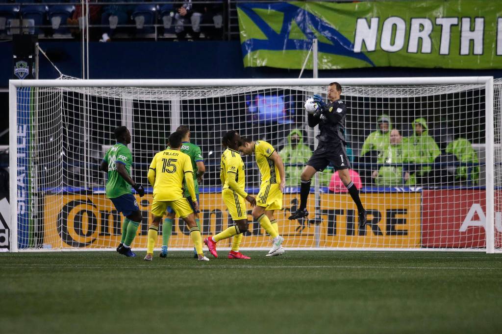 Nashville goaltender Joe Willis makes a save during the opening game of the 2022 season against Seattle on Sunday, Feb. 27, 2022, at Lumen Field in Seattle, Washington. (Ryan Berry / The Herald)