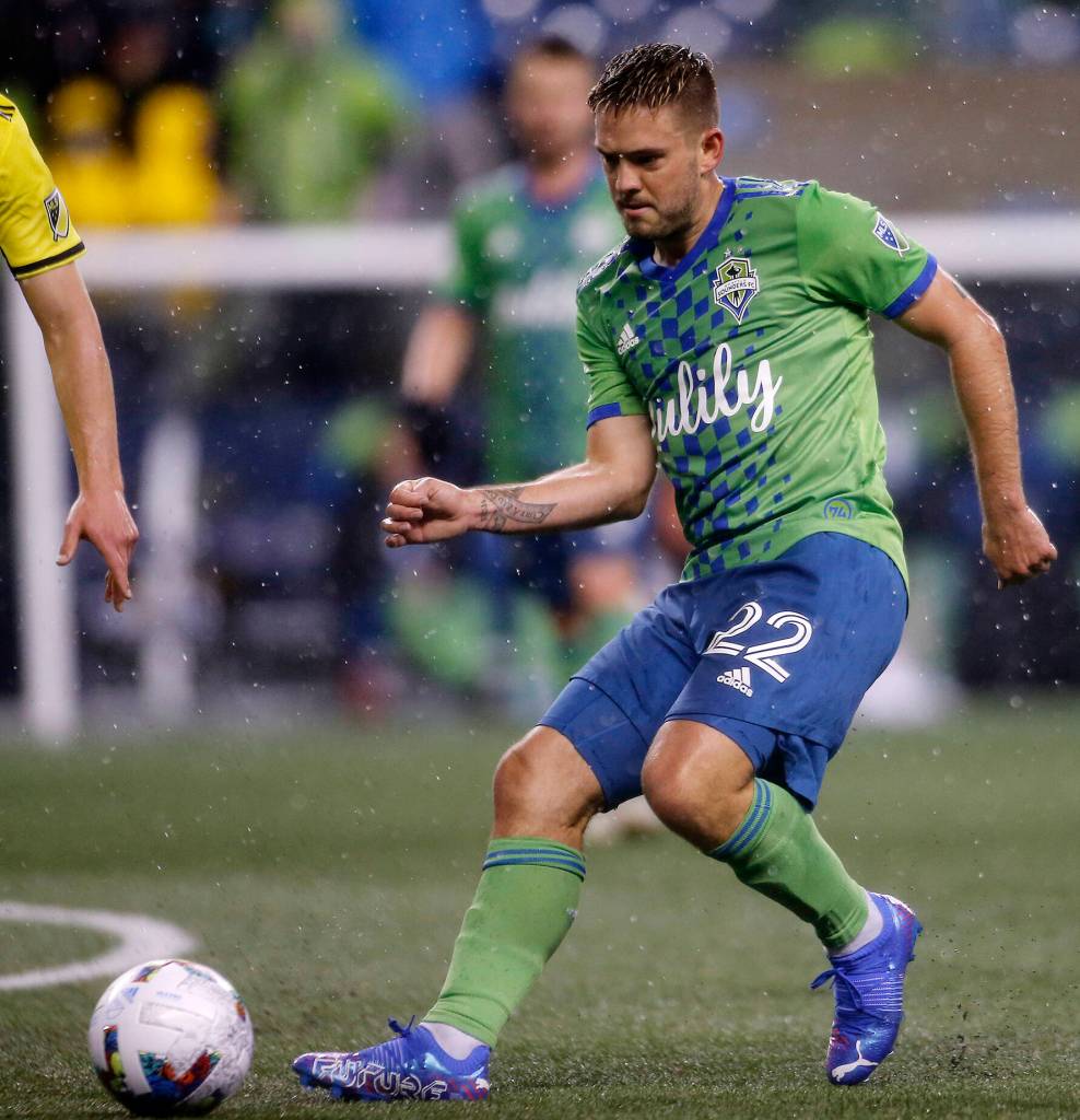 The Seattle Sounders Kelyn Rowe tries a lead pass through the box during the opening game of the 2022 season against Nashville SC on Sunday, Feb. 27, 2022, at Lumen Field in Seattle, Washington. (Ryan Berry / The Herald)