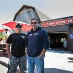 Penn Cove Brewery owners Mitch and Marc Aparicio at their new Freeland location. (Olivia Vanni / The Herald)