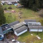 An aerial view of the proposed site for the Faith Family Village Project pallet homes for families is seen Tuesday in Everett. (Olivia Vanni / The Herald)