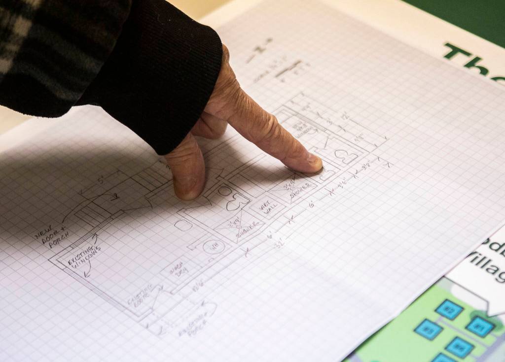 Outlines of one of the communal building for the Faith Family Village in Everett. (Olivia Vanni / The Herald)