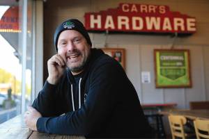 R.J. Whitlow, co-owner of 5 Rights Brewery, has recently expanded to the neighboring shop, formerly Carr's Hardware. (Kevin Clark / The Herald)