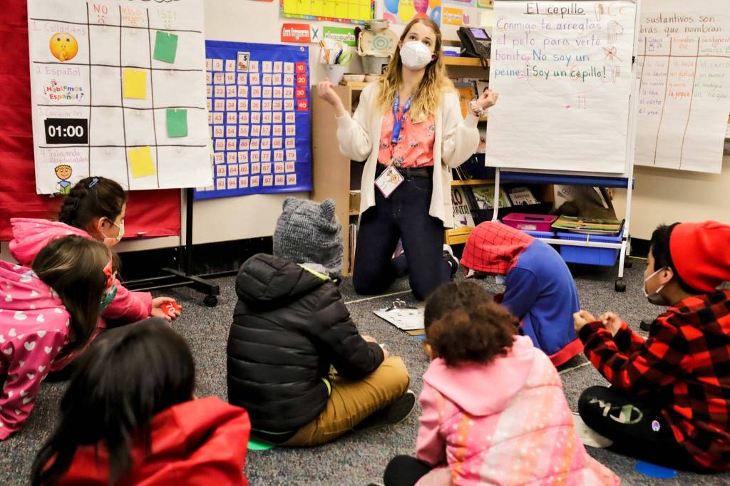 Erika Rabura leads her class at College Place Elementary School in Lynnwood. (Kevin Clark / The Herald)