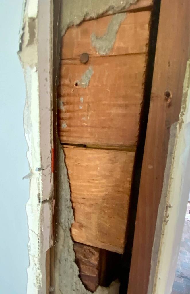 Shiplap walls original to the home can be seen during renovation. (Andrea Brown / The Herald)