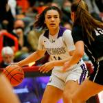 Lake Stevens’ Baylor Thomas takes the ball across the half court line against Eastlake Saturday, Feb. 26, 2022, during a Class 4A regional matchup at Everett Community College in Everett, Washington. (Ryan Berry / The Herald)