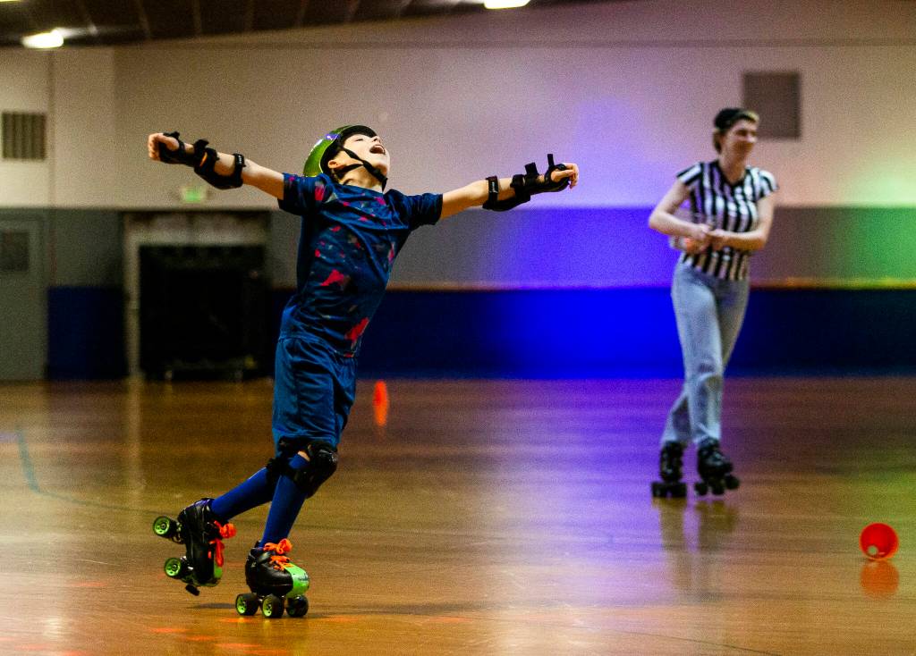 Dylan Norsby, 9, reacts to winning the final race of the night at the Everett Skate Deck. (Olivia Vanni / The Herald)