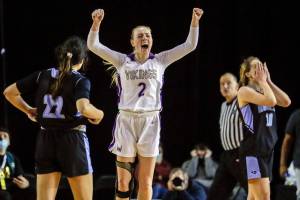 Lake Stevens' Chloe Pattison celebrates their victory over Rogers Wednesday afternoon in Tacoma, Washington on March 2, 2022. The Vikings advance with the 41-37 overtime win over the Rams. (Kevin Clark / The Herald)