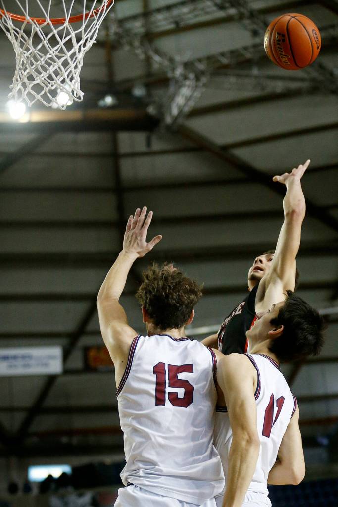 Mountlake Terraces Chris Meegan tries the floater against Mt. Spokane on Thursday at the Tacoma Dome. (Ryan Berry / The Herald)