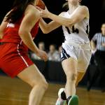 Arlington senior Keira Marsh drives to the basket during the Eagles 50-47 win over league rival Snohomish in a Class 3A state quarterfinal Thursday night in the Tacoma Dome. (Ryan Berry / The Herald)