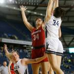 Arlingtons Jenna Villa and Snohomishs Tyler Gildersleeve-Stiles go up for a rebound Thursday at the Tacoma Dome. (Ryan Berry / The Herald)