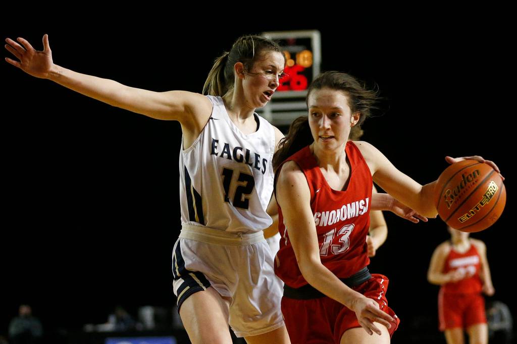 Snohomishs Ella Gallatin drives to the hoop against Arlington on Thursday at the Tacoma Dome. (Ryan Berry / The Herald)