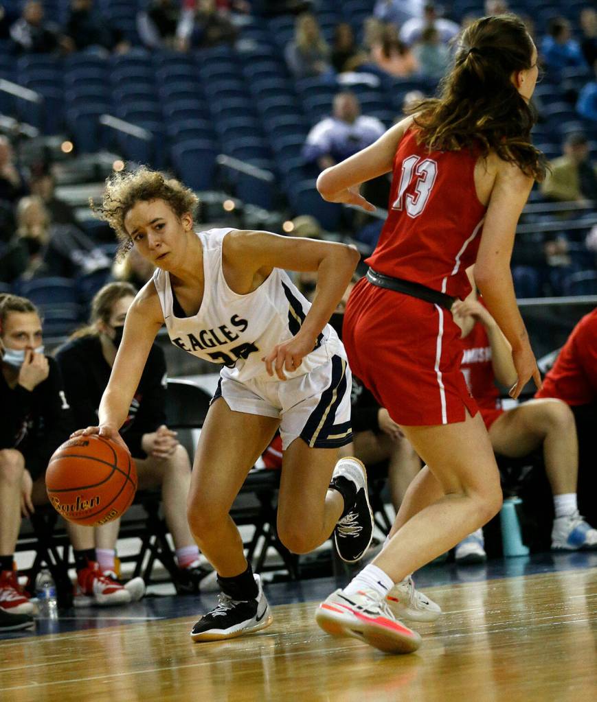 Arlingtons Samara Morrow gets around a defender against Snohomish on Thursday at the Tacoma Dome. (Ryan Berry / The Herald)