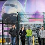 In this March 2020 photo, workers head out a gate at a Boeing airplane manufacturing plant in Renton. On Thursday, the company will pay out the final and largest round of this years annual bonuses. (AP Photo/Elaine Thompson, File)