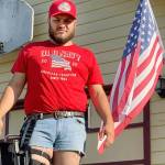 The Snohomish County Sheriff’s Office launched an investigation into the background of Calvin Walker, a new hire, after a sergeant expressed concerns about a comment on a photo posted to Walker’s Facebook page in August 2020. A friend asked whether the image, showing Walker in cowboy boots and an American flag t-shirt, was “racist or misogynistic.” Walker responded, “it’s honestly a lot of both.” Walker was fired from the Sheriff’s Office in January 2022 as a result of the investigation. (Snohomish County Sheriff's Office)