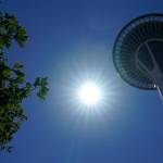 The sun shines near the Space Needle, June 28, 2021, in Seattle as Northwest cities broke all-time heat records, with temperatures soaring well above 100 degrees Fahrenheit. Weather extremes like this will increase in frequency and intensity in North America the coming years as global warming accelerates, according to a United Nations Intergovernmental Panel on Climate Change report released last week. (Ted S. Warren / Associated Press)